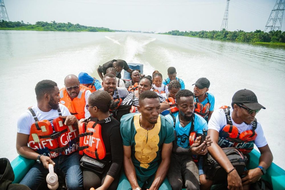The Roli Mabo Foundation team travelling by boat through the Niger Delta creeks