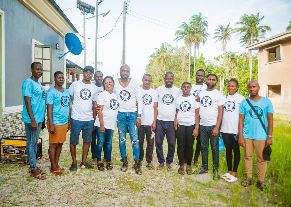 The Roli Mabo Foundation team gathered outside a community healthcare center